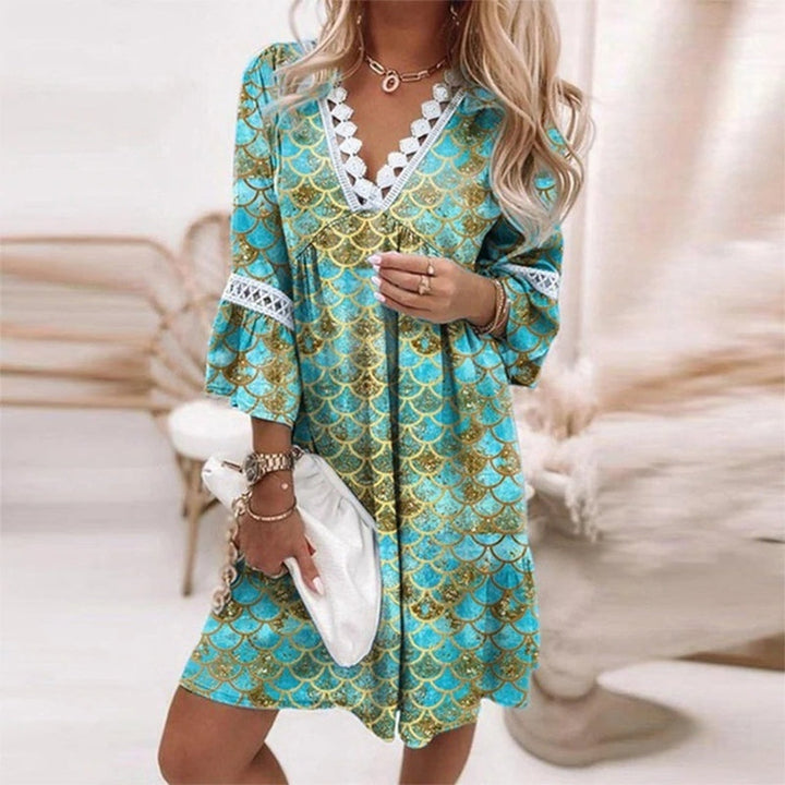 Flattering women's printed mini dress with a chic bohemian style. Comfortable flowy design for spring casual fashion.