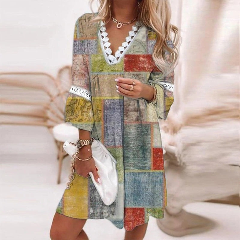 Feminine short bohemian mini dress for women, showcasing a beautiful print and comfortable flowy fabric. Casual boho chic.