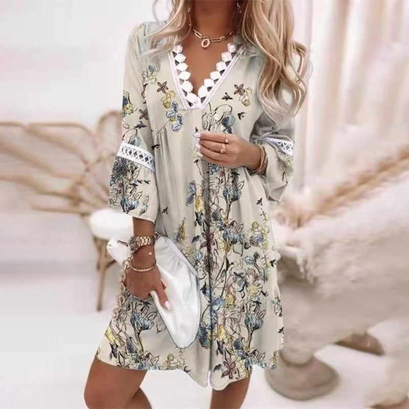 Versatile women's bohemian printed mini dress. Flowy and flattering, perfect for summer, spring, or vacation. Chic style.