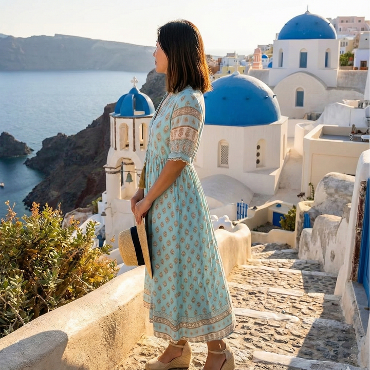 Women's boho summer midi dress with tiered design and practical pockets, great for casual elegance.