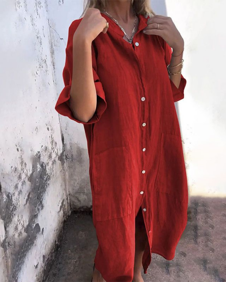 Front view of a relaxed fit women's bohemian shirt dress, button-down & tie waist detail.