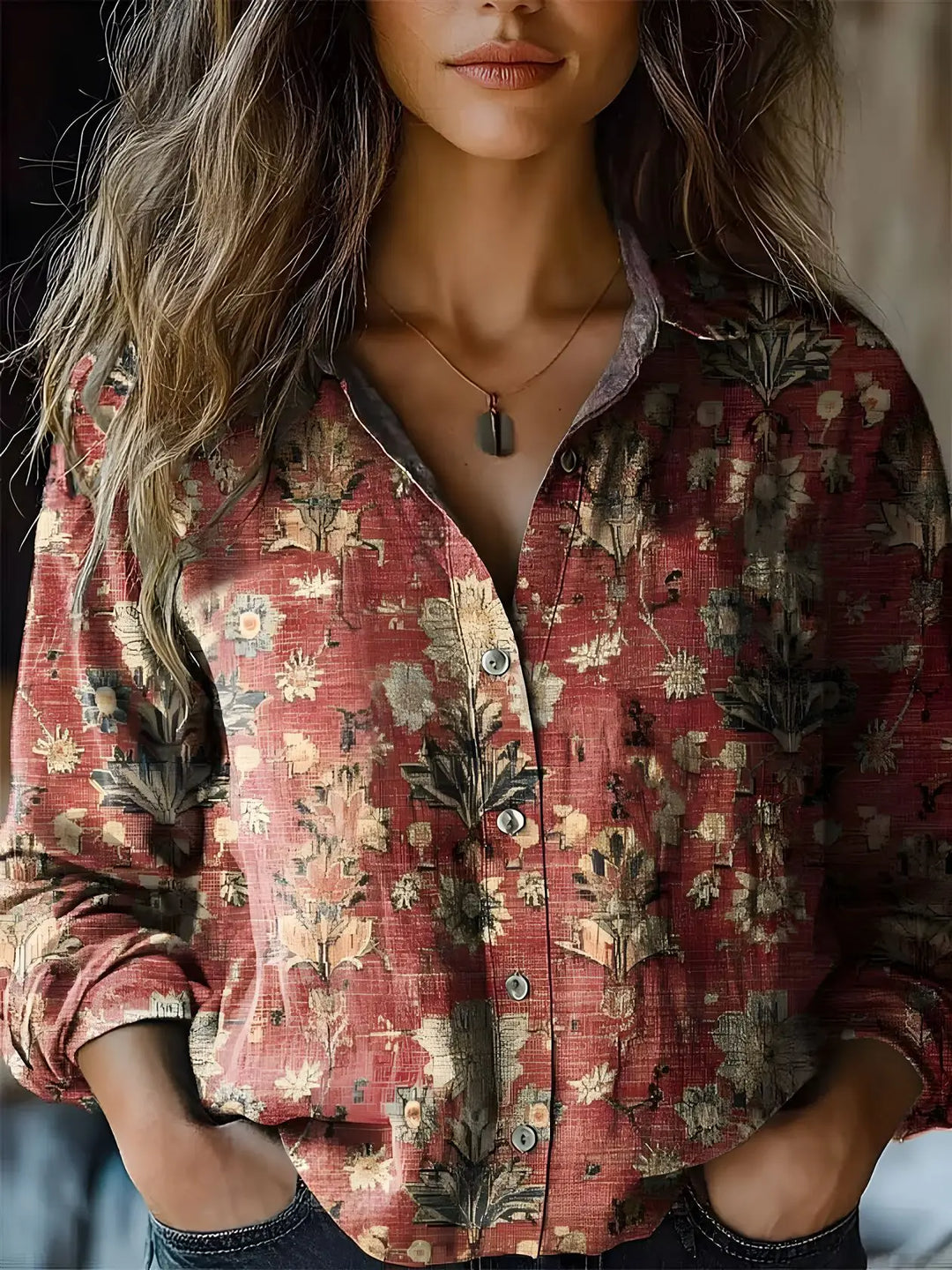 Bohemian print long sleeve button-up blouse for women. Features a stylish floral and paisley pattern, relaxed fit.