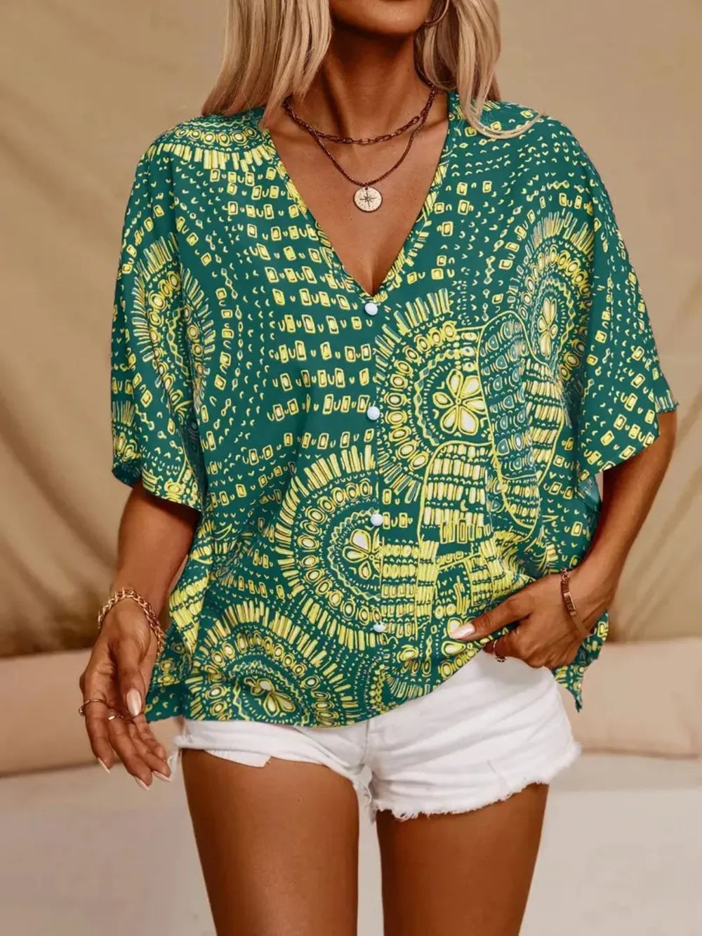 Bohemian women's blouse, V-neck, all-over colorful print, comfortable and stylish for summer.