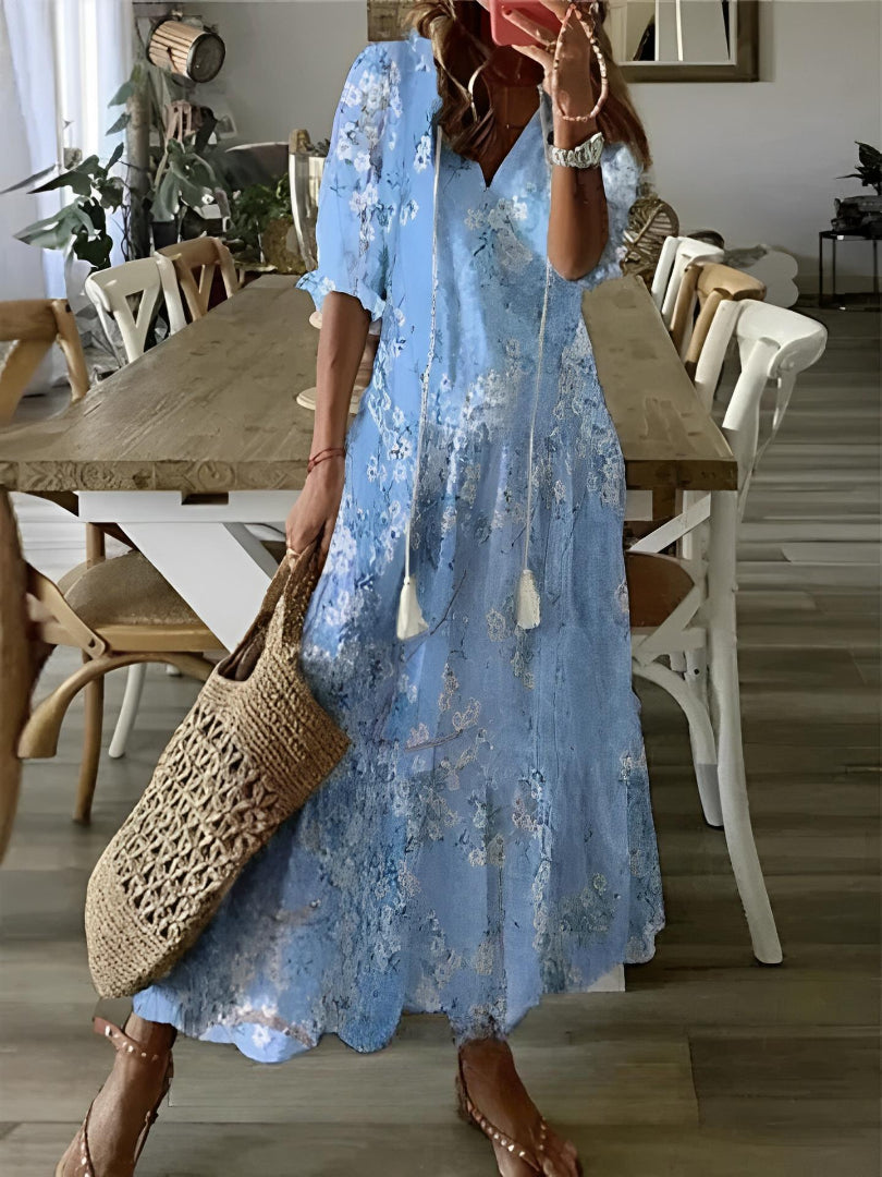 Lightweight women's boho maxi dress, V-neck printed design. Ideal for comfortable summer outings and spring events.