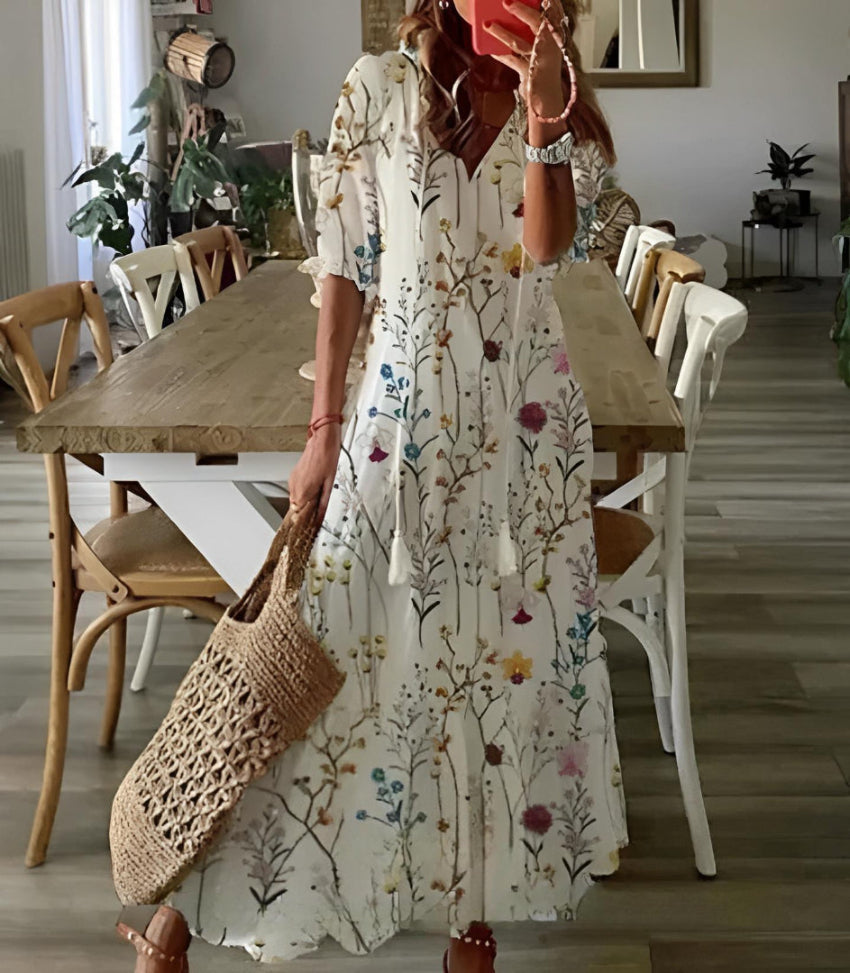 Beautiful printed boho women's maxi dress. V-neck vintage style, long and comfortable for spring & summer fashion.
