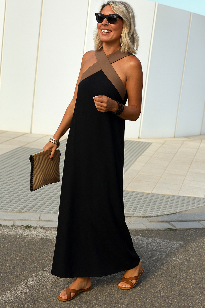 Women's breathable maxi dress with a flattering crossed design, ideal for summer comfort.
