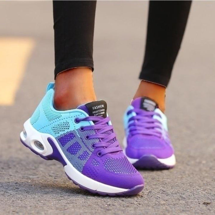 Athletic style women's walking shoes, designed for lightweight comfort & breathable all-season wear.