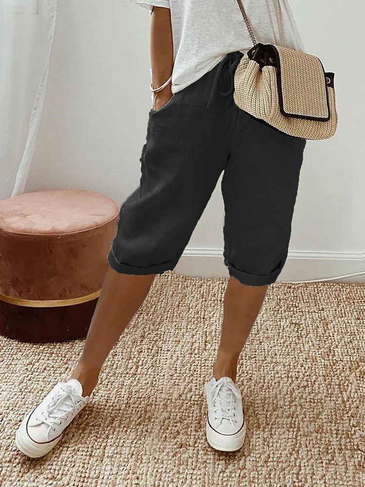 Women's breathable knee-length capri pants, elastic waist with drawstring for ultimate comfort & casual summer style.