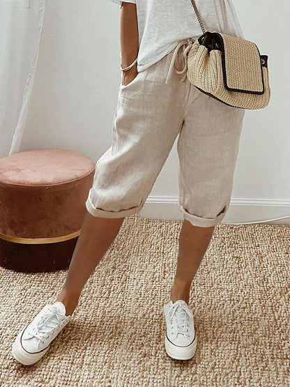 Relaxed fit women's knee-length pants, breathable and comfortable, ideal for casual wear & summer activities.