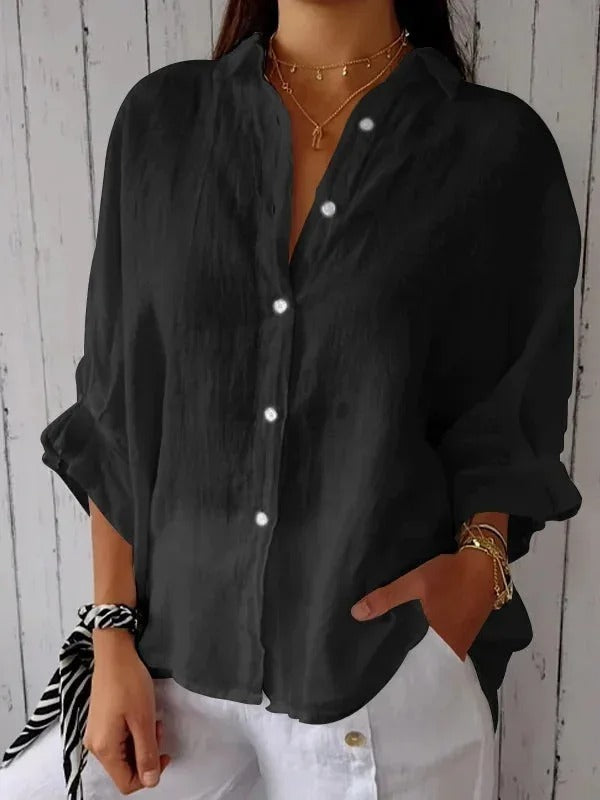 Stylish women's button-up linen shirt with long sleeves, ideal for casual summer outfits.