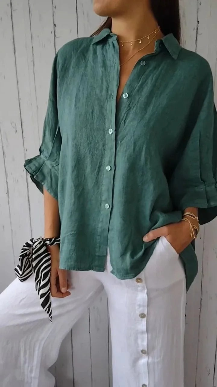 Relaxed fit women's linen button-up shirt, a breathable and stylish casual top for summer fashion.