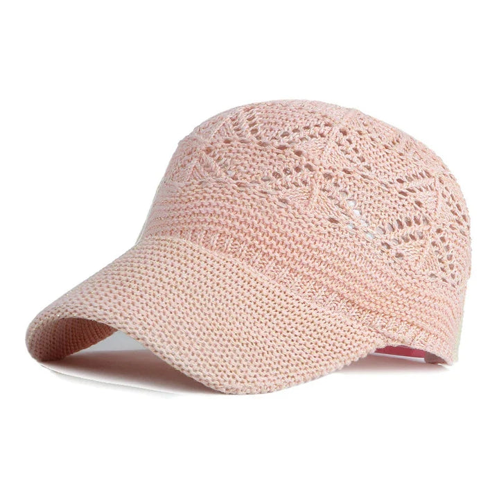 Adjustable women's sun hat with breathable mesh, hollow knit design, perfect summer baseball cap.