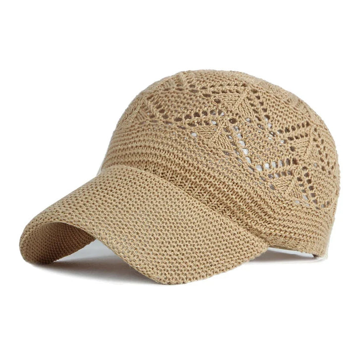 Hollow knit mesh sun hat for women, breathable & adjustable summer baseball cap, vacation ready.