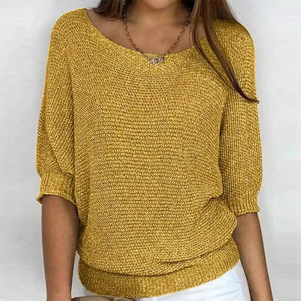 Chic women's breezy summer knit jumper; a lightweight, short-sleeve top for relaxed casual style.