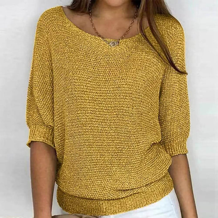 Chic women's breezy summer knit jumper; a lightweight, short-sleeve top for relaxed casual style.