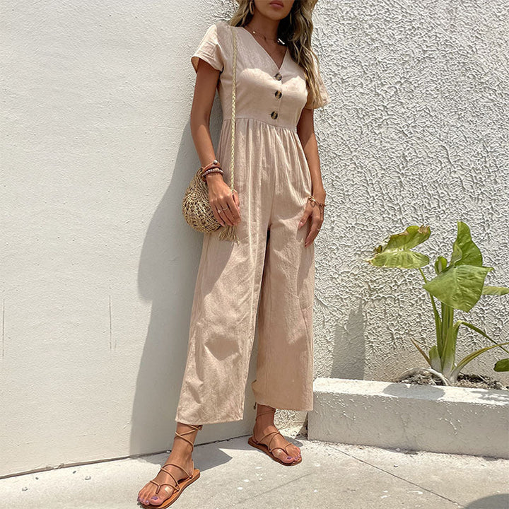 Elegant women's wide leg linen jumpsuit, ideal for effortless summer style. Relaxed fit and breathable.