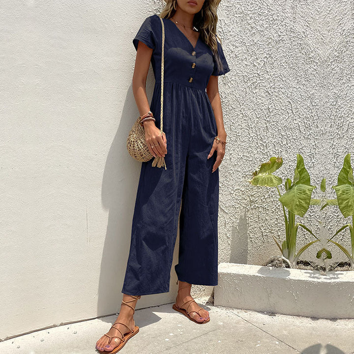 Women's relaxed fit wide leg linen jumpsuit. Breezy and comfortable for stylish summer outings.