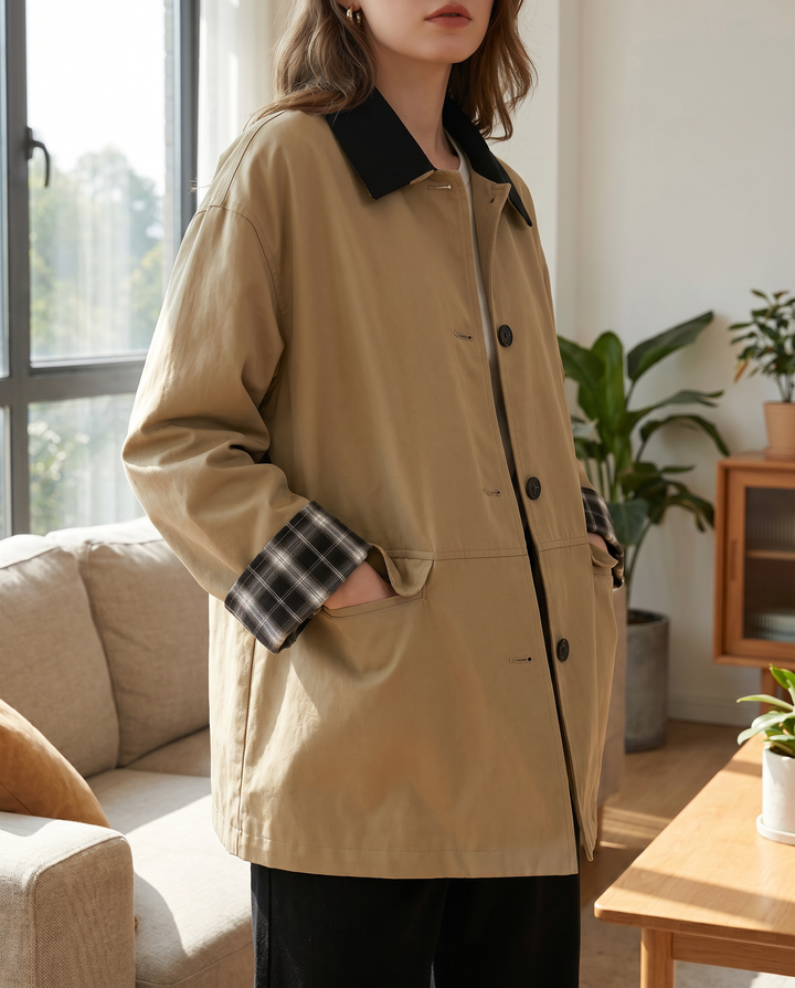 Versatile women's button-up jacket, contrast trim. Ideal for comfortable, casual spring layering.