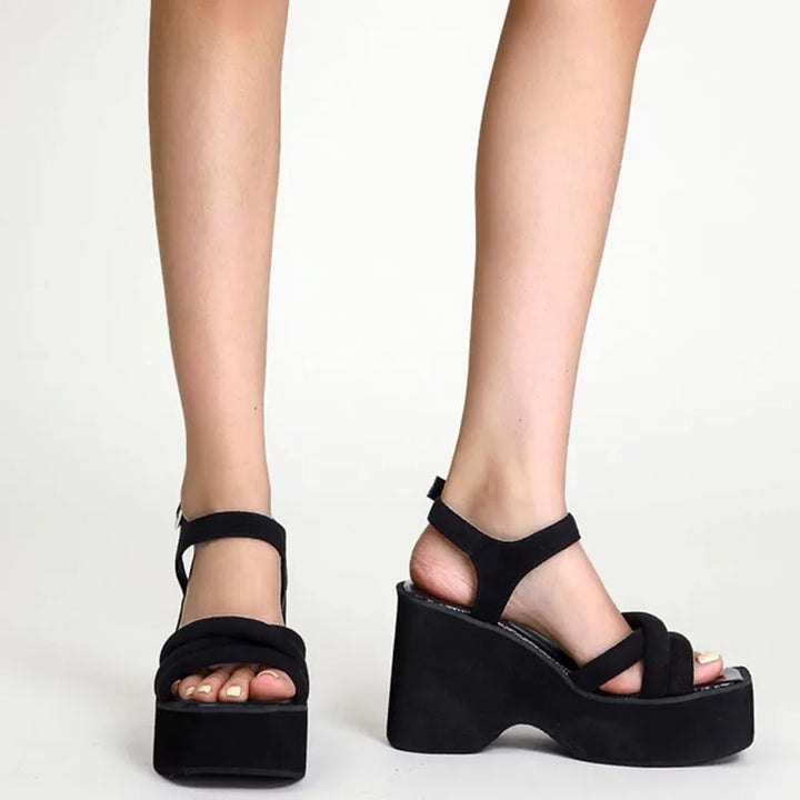 Elegant Carmela black strappy sandals for women, perfect for comfortable summer wear & fashion.