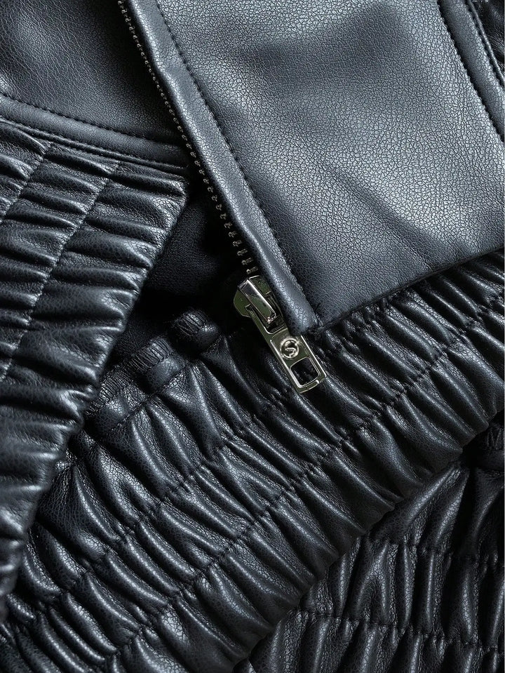 Women's stylish black jacket, perfect casual outerwear for a fashionable layered appearance.