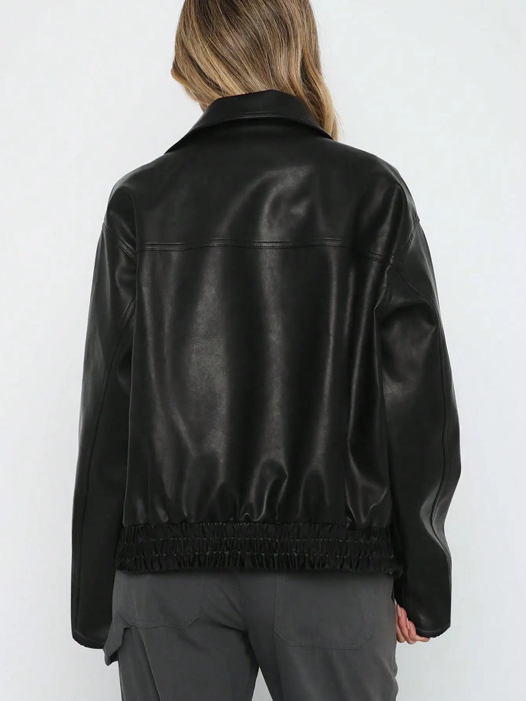 Fashionable women's black jacket, great for casual outings and a versatile layered look.