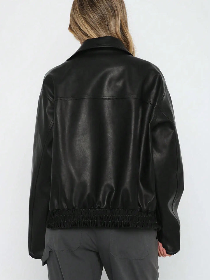 Fashionable women's black jacket, great for casual outings and a versatile layered look.