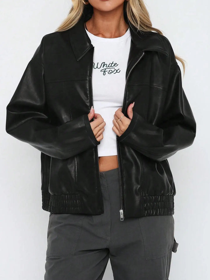 Everyday women's black jacket, offering a comfortable and stylish casual outerwear option.