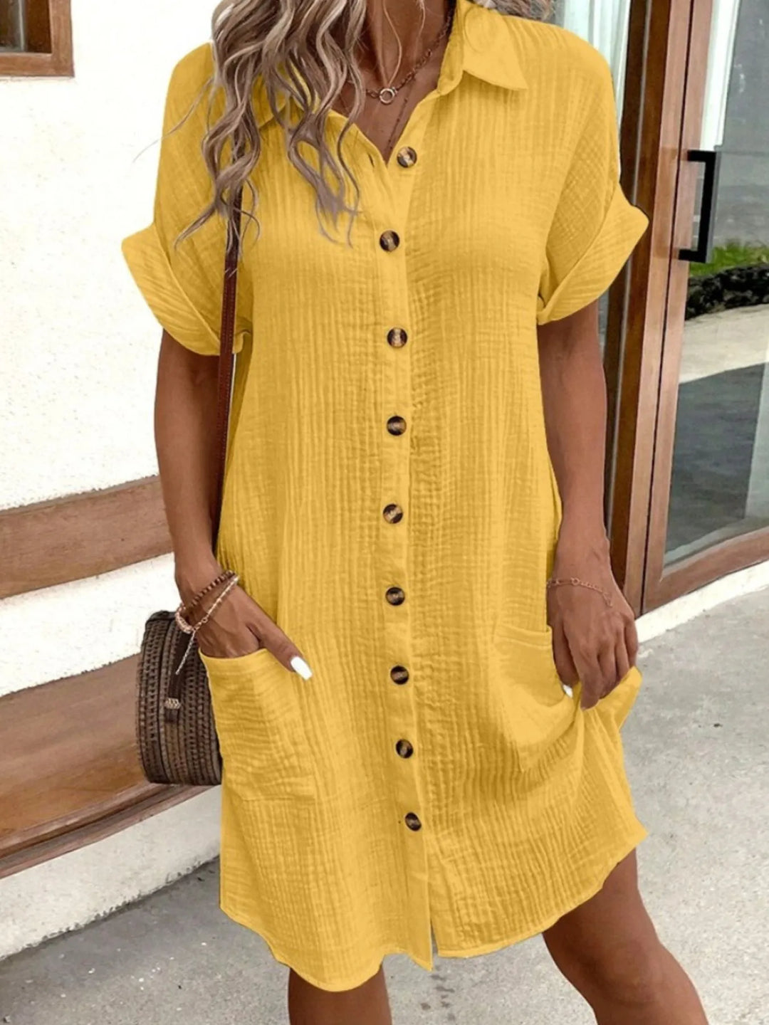 Practical women's casual button-down mini dress with short sleeves and useful pockets for daily wear.