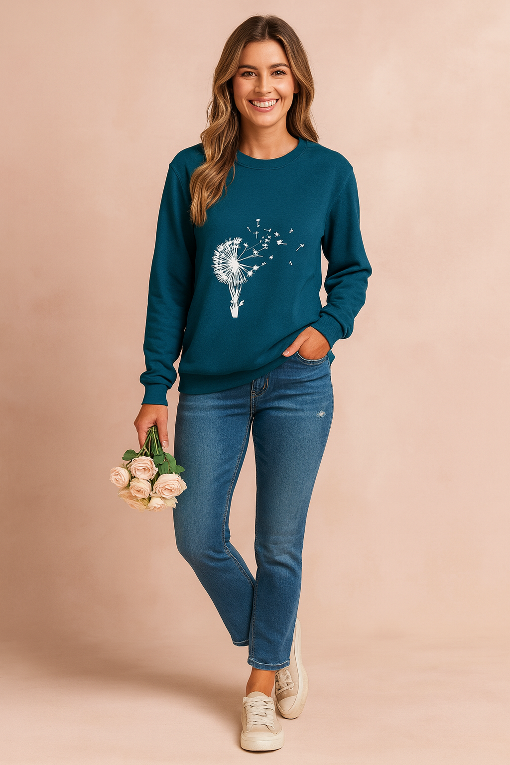 Relaxed fit women's dandelion print sweater. Comfortable crew neck, long sleeve top ideal for everyday casual wear.