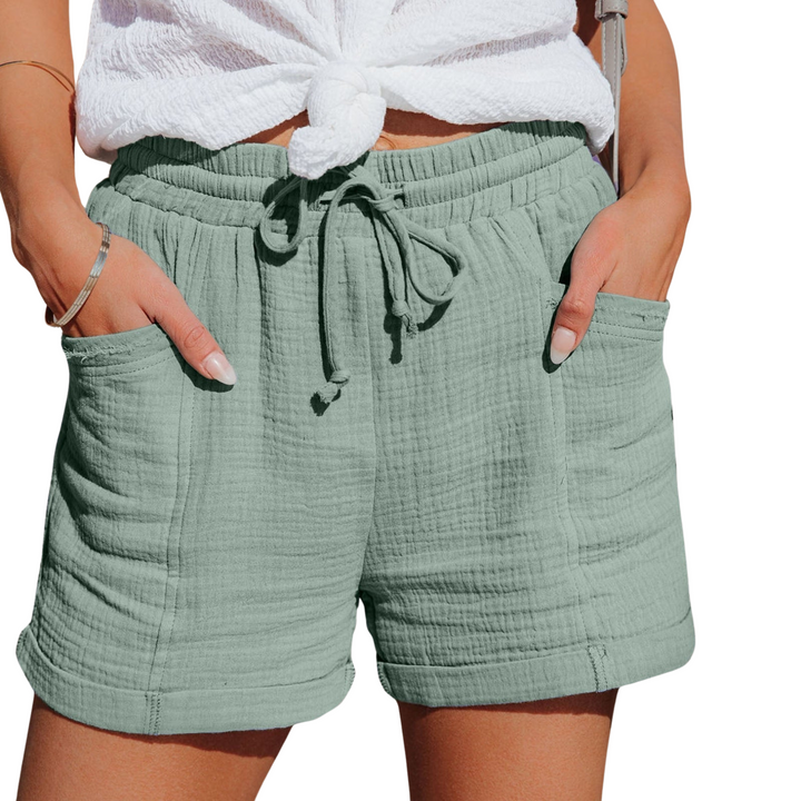 Women's casual drawstring shorts with front pockets, perfect for everyday comfort & summer style.