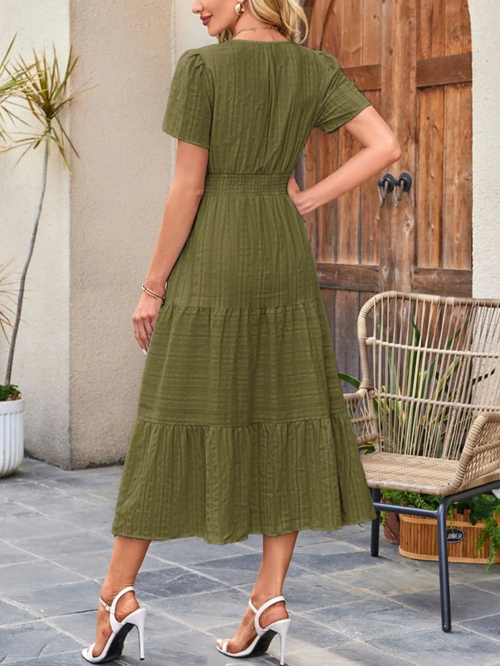 Effortlessly stylish women's casual midi dress, comfortable, flowy, and featuring useful pockets.