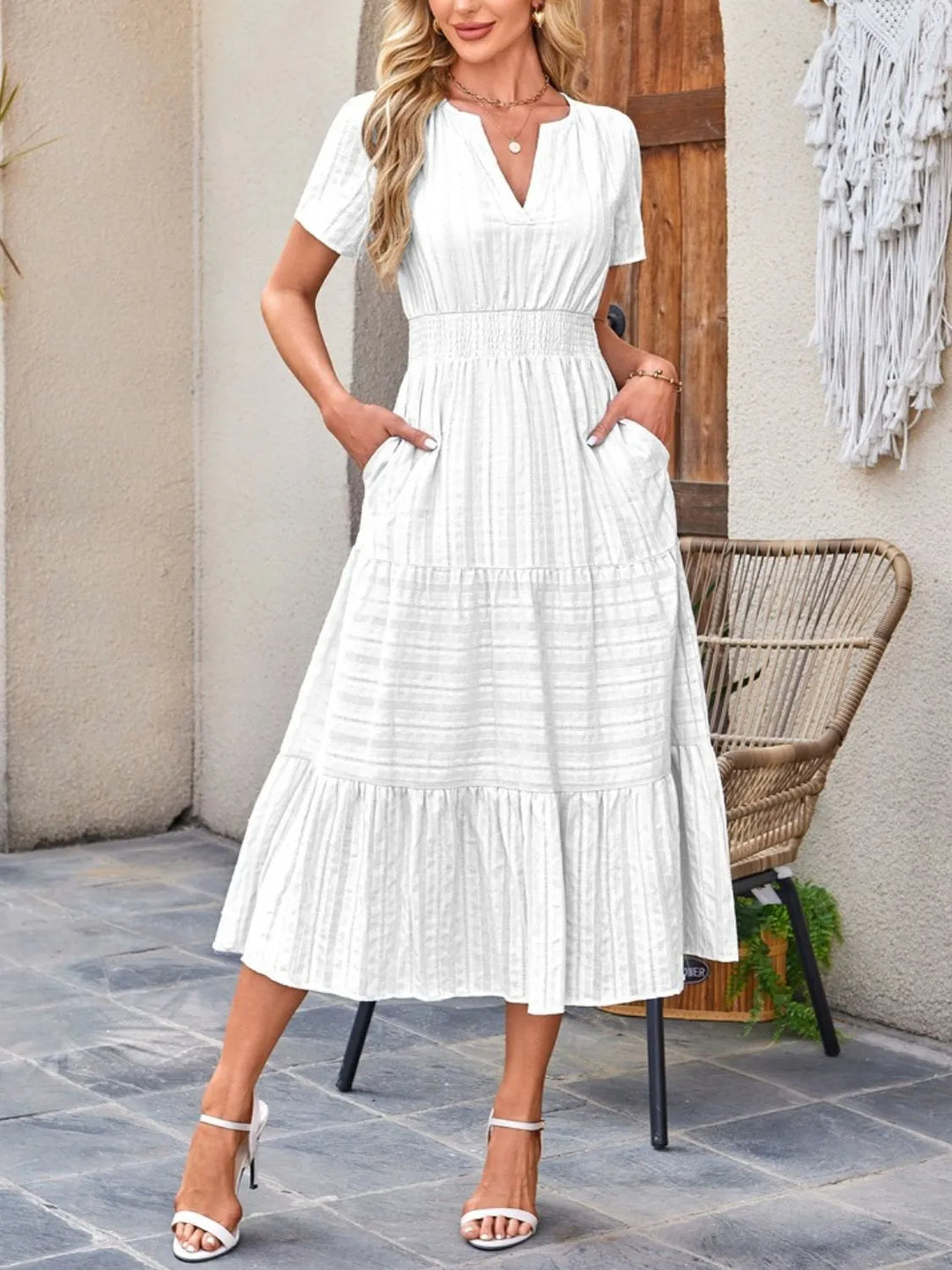 Chic women's flowy midi dress, short sleeves, flattering silhouette, and handy side pockets.