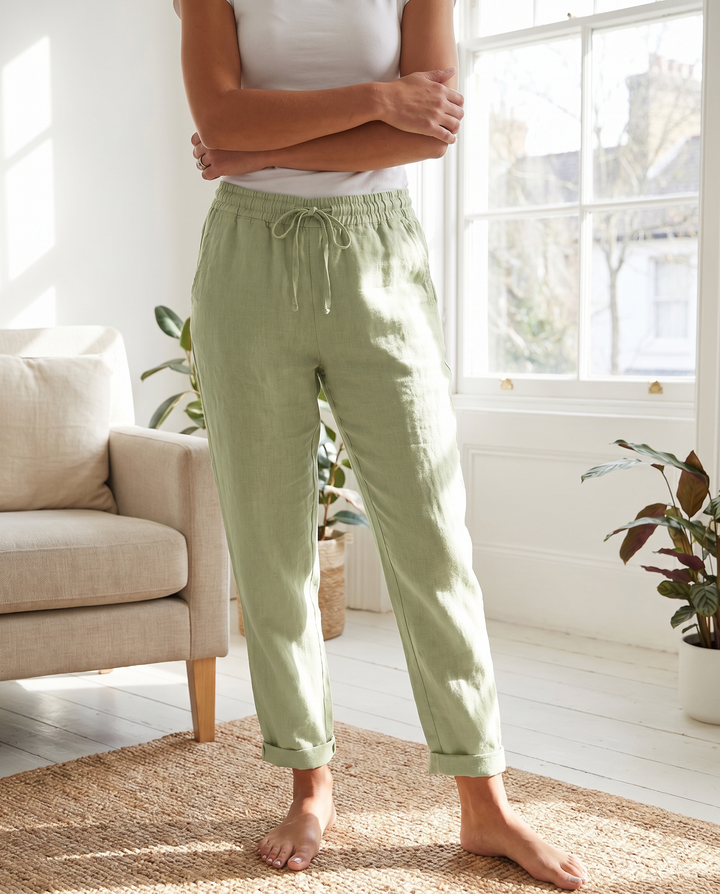 Women's casual lightweight linen trousers with drawstring waist & tapered leg. Perfect for summer.