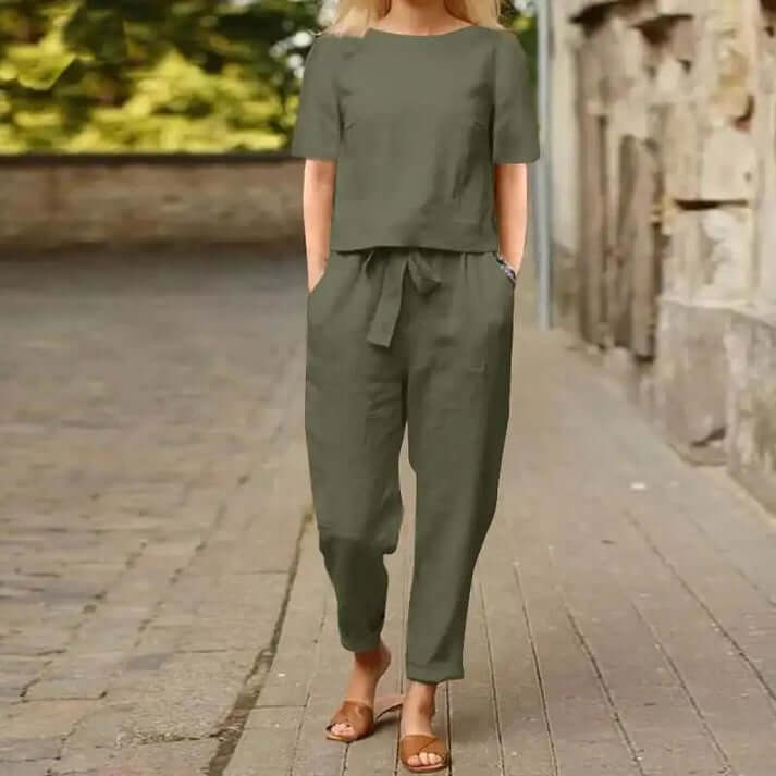 Comfortable women's casual summer set. A stylish two-piece outfit with shorts & top for warm weather.