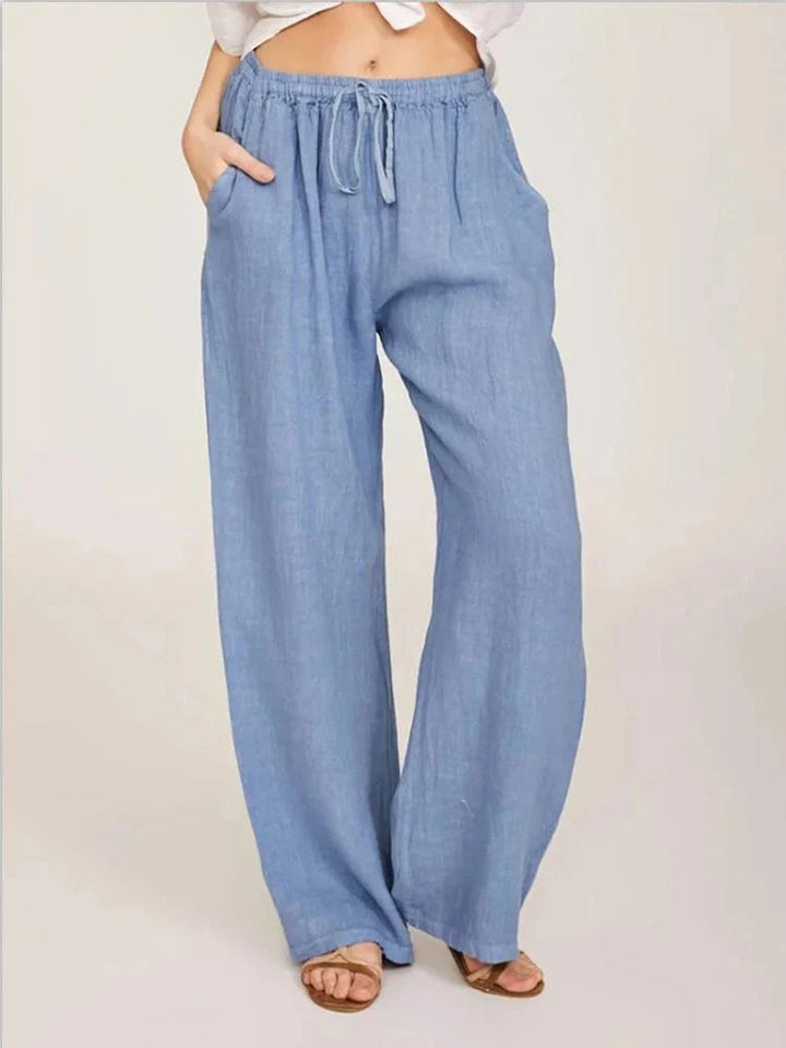 Women's casual wide-leg pants with a relaxed, loose fit & drawstring waist, perfect for everyday comfort.