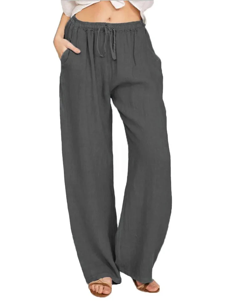 Women's comfortable wide-leg pants, featuring a loose fit, drawstring waist, and pockets for casual style.