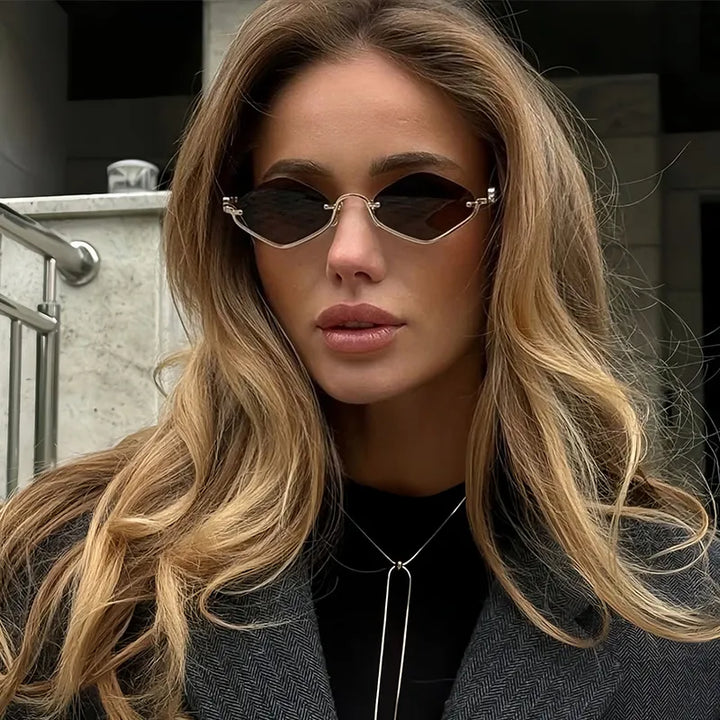 Women's cat-eye sunglasses with stylish tinted lenses & UV400 protection. Fashionable, trendy sun accessory.