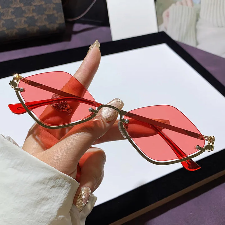 Trendy women's cat-eye sunglasses with geometric frames, UV400 sun protection, and chic tinted lenses.
