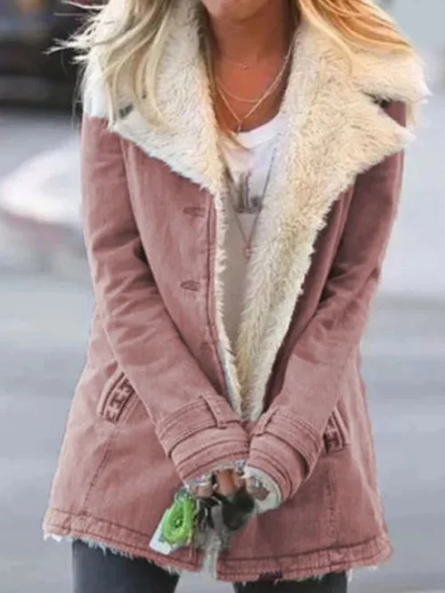 Weather-resistant Celeste winter coat for women. Durable, warm, & stylish outerwear for cold conditions.