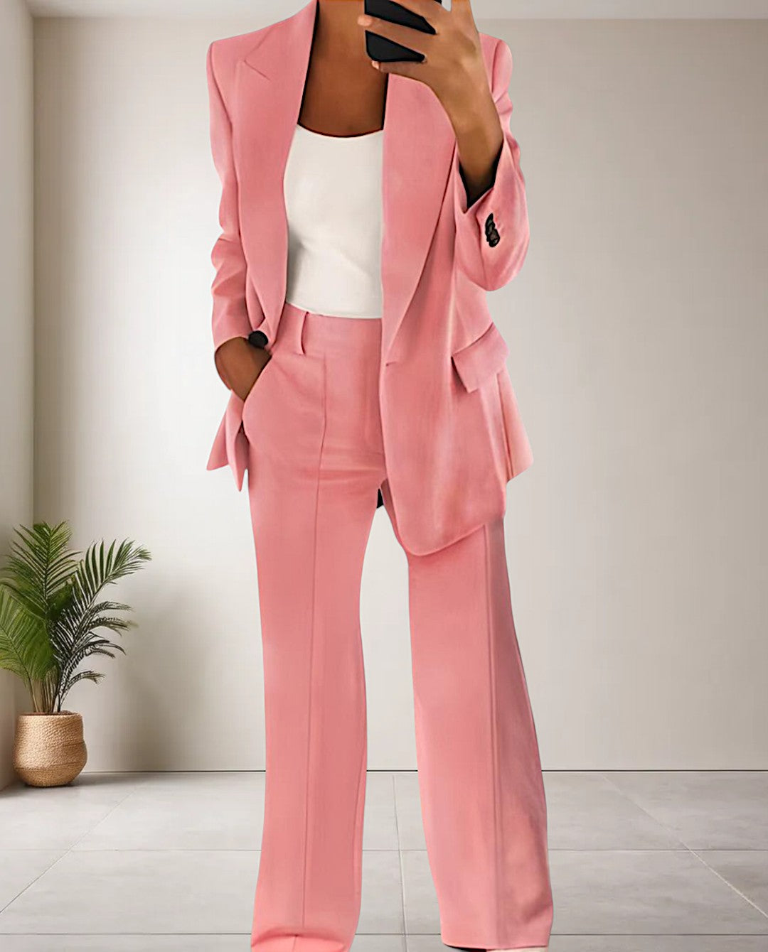 Sophisticated Women's Isabella two-piece set; a sleek blazer and comfortable trousers for business, formal, or casual chic.