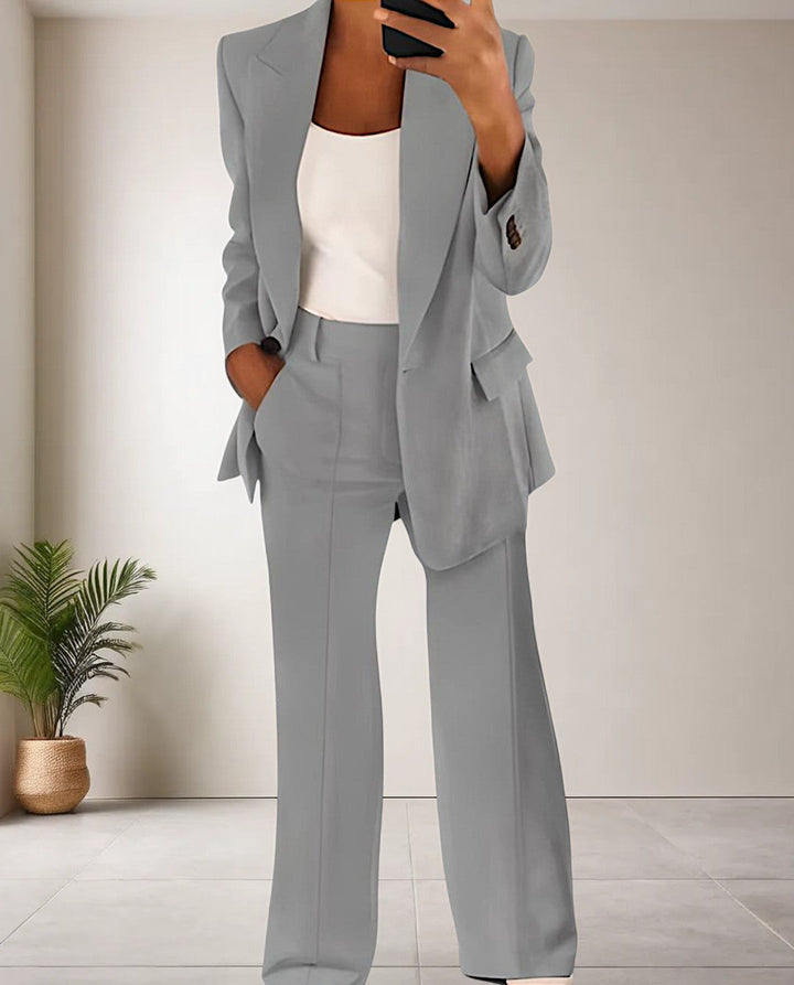 Fashionable women's Isabella pantsuit set; an elegant blazer and smart trousers for business attire or versatile casual wear.