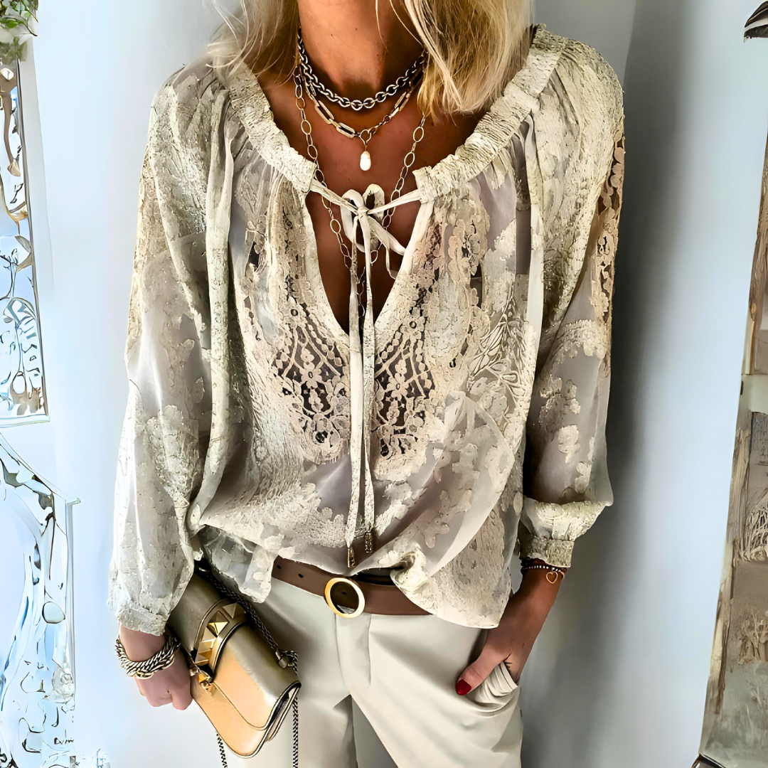 Women's chic crocheted bohemian blouse, perfect for summer. Relaxed fit, versatile boho top.