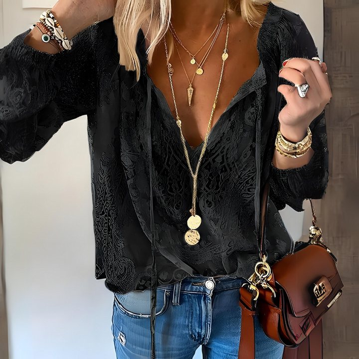 Effortless women's bohemian blouse with intricate crocheted detail. Perfect casual spring & summer wear.
