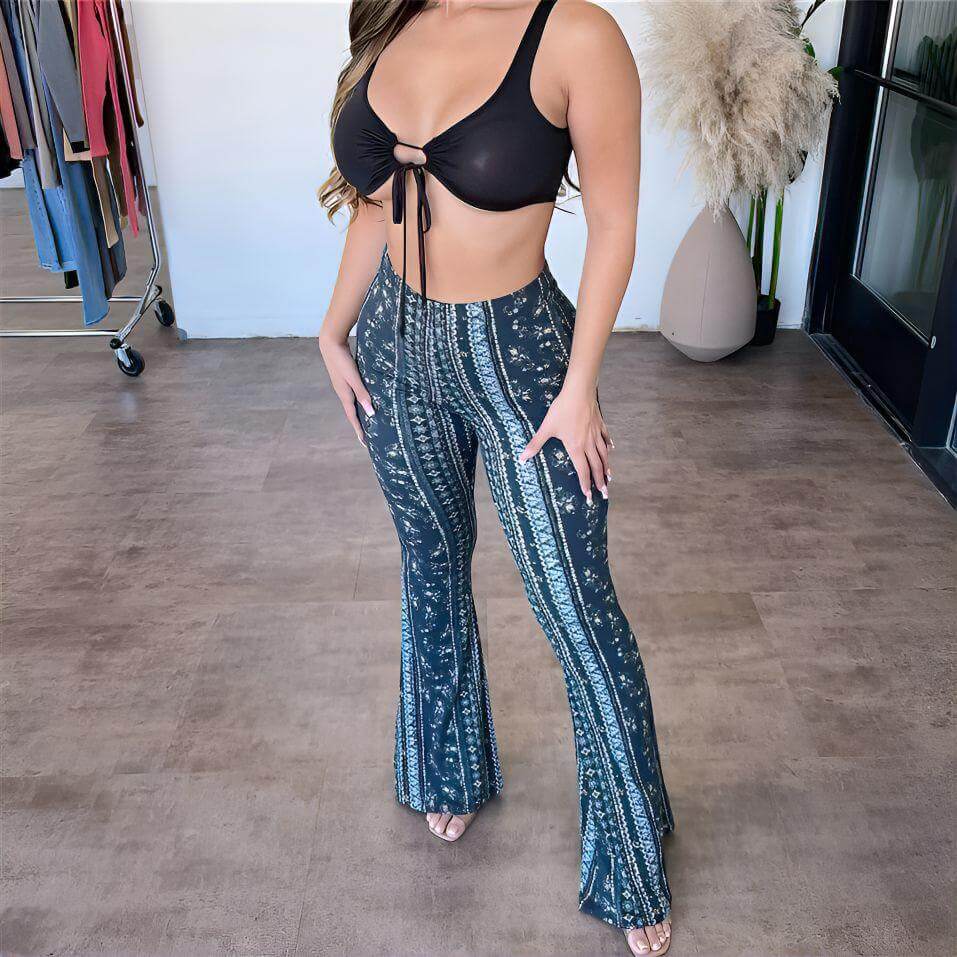 Comfortable women's fashion trousers, flared leg and chic cut-outs, ideal for a stylish, modern wardrobe.