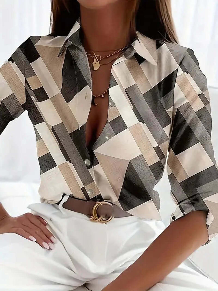 Women's chic floral & plaid long-sleeve button-up shirt; a versatile top blending two classic patterns.