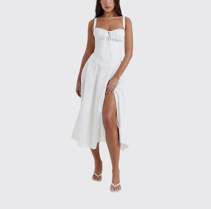Flowy women's sleeveless midi dress, featuring a beautiful floral print and a stylish tie front. Perfect for warm days.