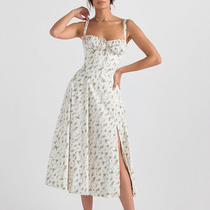 Vibrant floral print women's midi dress, sleeveless with a cute tie front. Perfect spring/summer vacation attire.