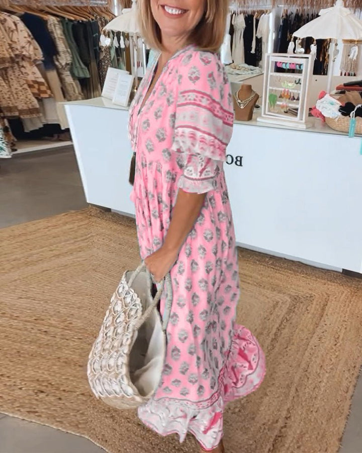 Vibrant floral maxi dress, V-neck, for women, a colorful spring/summer statement.