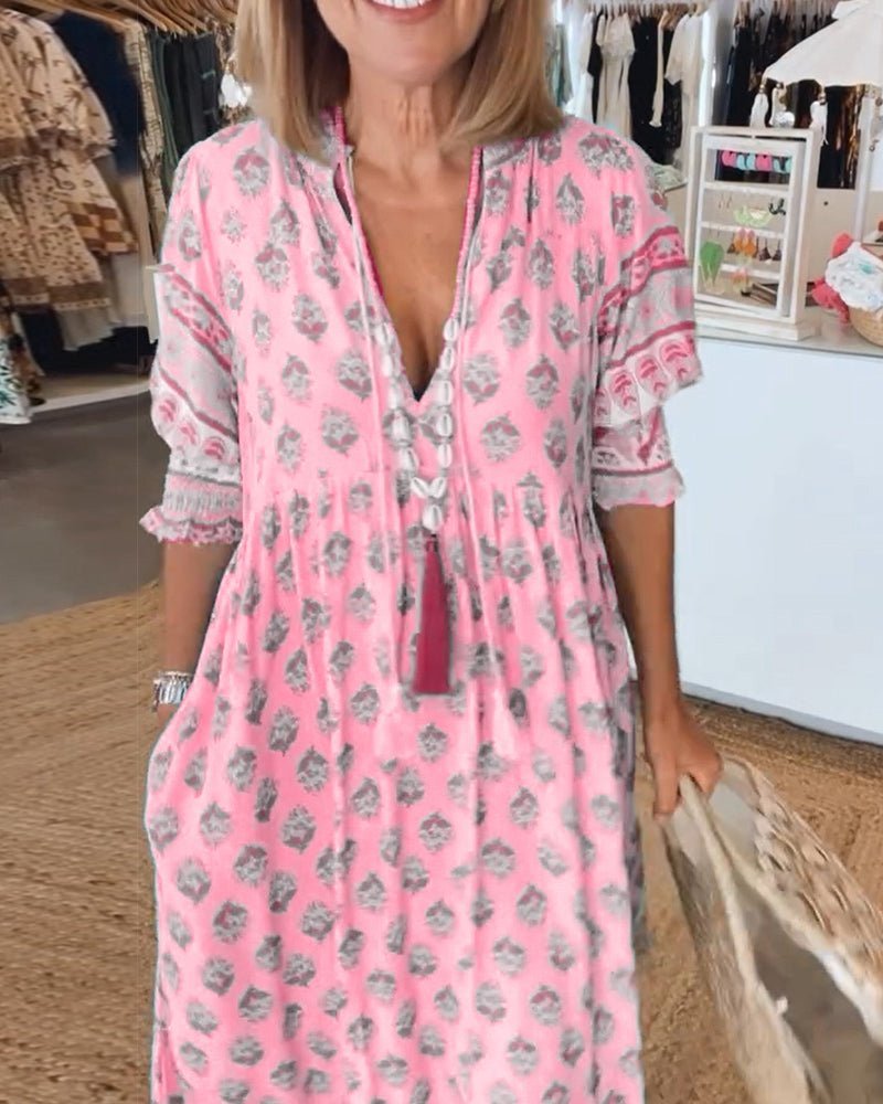 Delicate floral print V-neck maxi dress for women, offering elegant spring fashion.