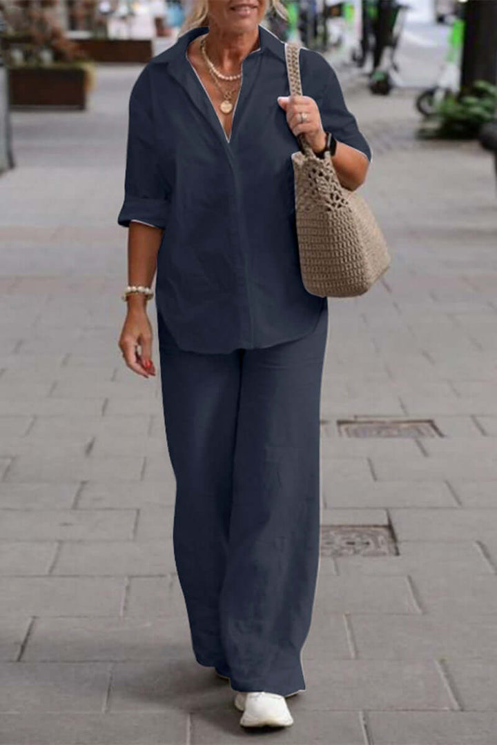 Elegant brown women's two-piece set with fold-over collar & long sleeves, ideal for professional or casual chic.